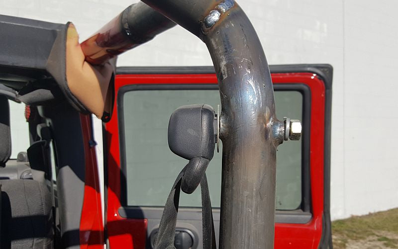 Welded bungs for shoulder harnesses