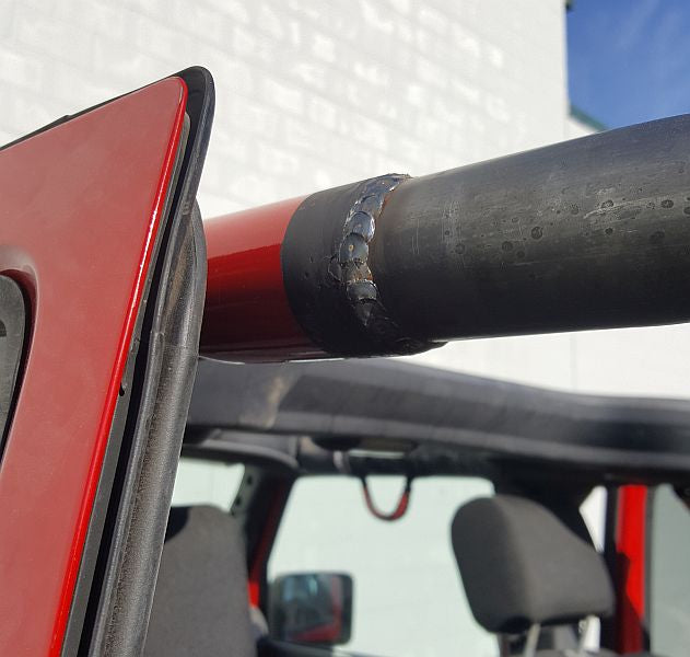 The new tubing fits inside the stock sport cage.